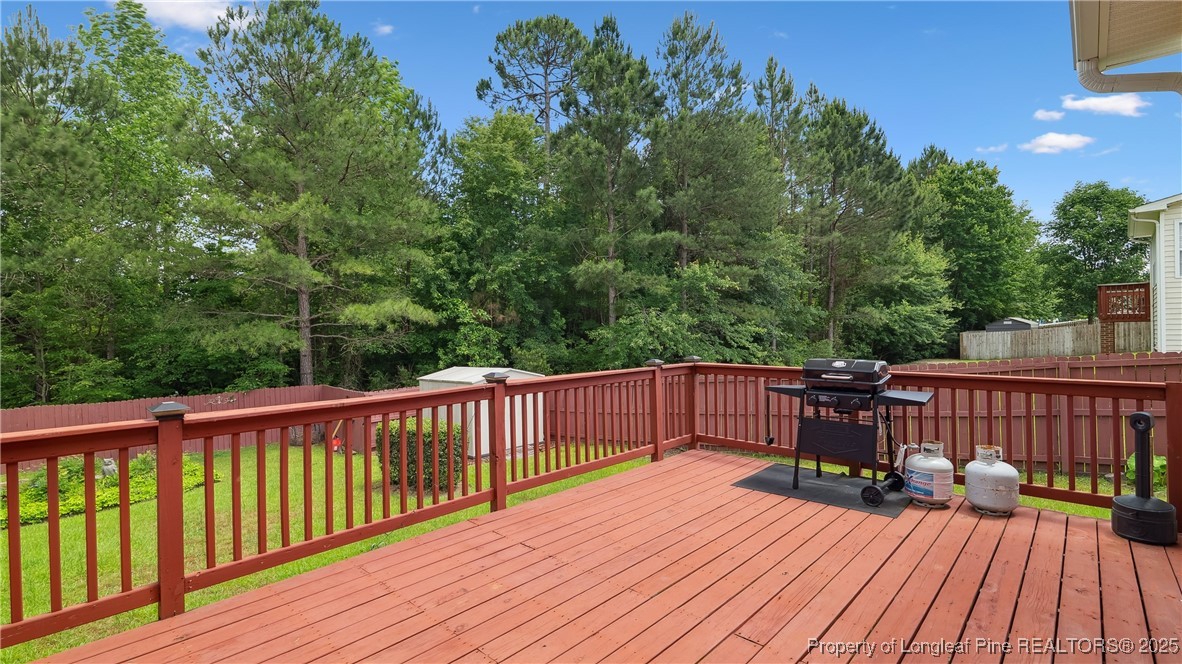 106 Linden Road Cameron, NC 28326 - Photo 41 of 48 a view of deck with patio and wooden floor