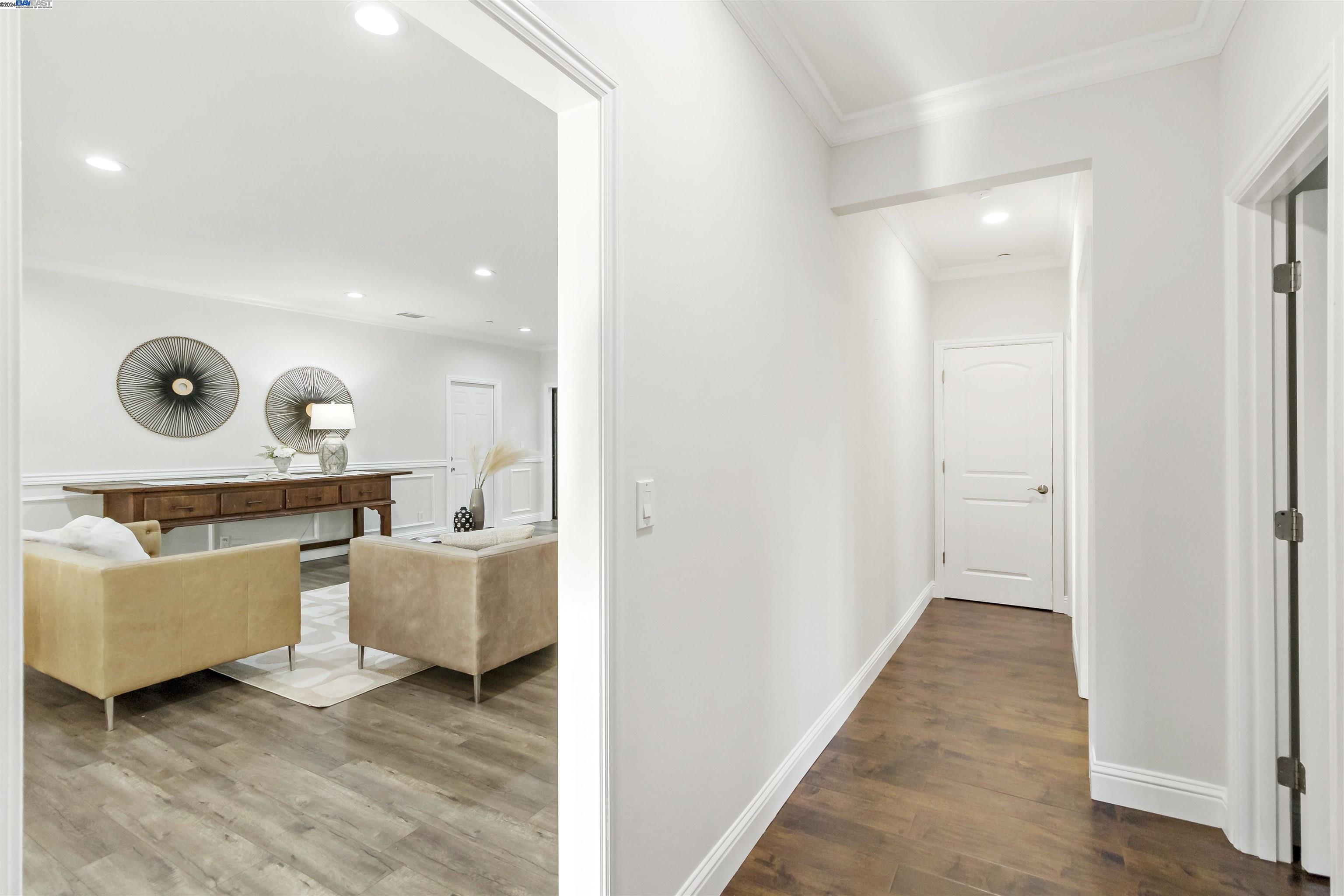 Warm Springs Fremont, CA 94539 - Photo 12 of 27 a living room with furniture and a wooden floor
