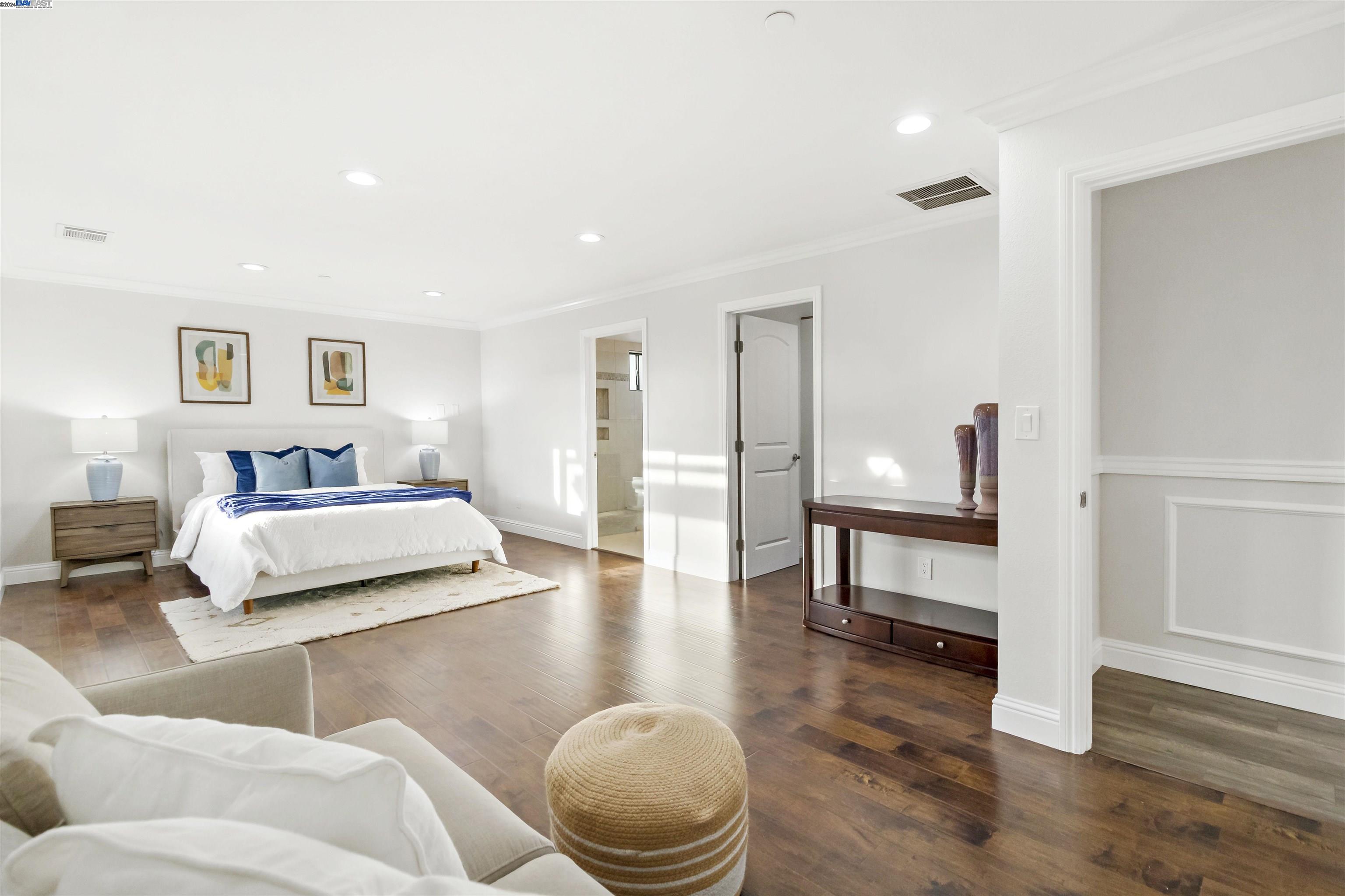 Warm Springs Fremont, CA 94539 - Photo 14 of 27 a bedroom with furniture and a wooden floor