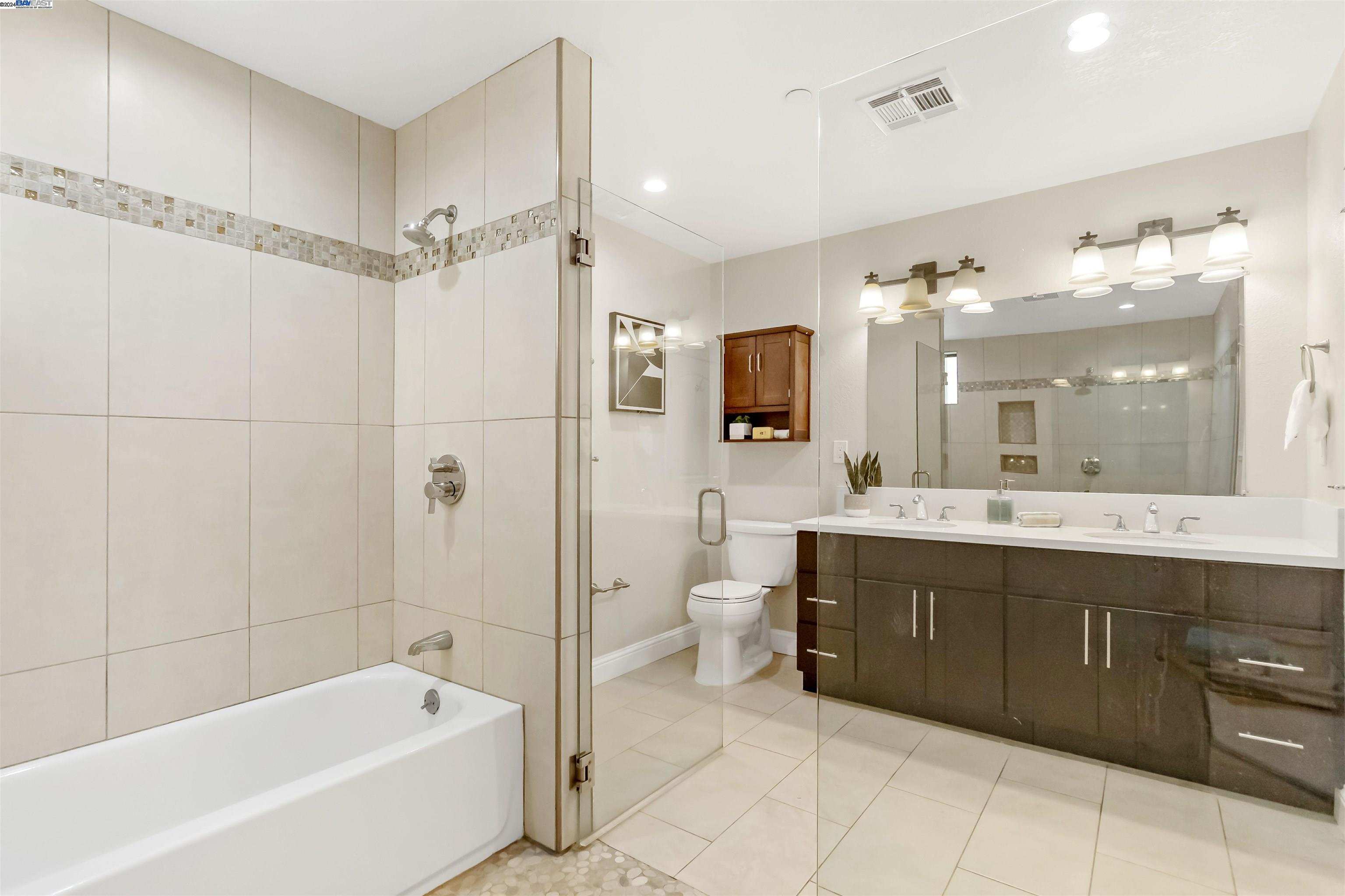 Warm Springs Fremont, CA 94539 - Photo 16 of 27 a bathroom with a tub sink shower and mirror