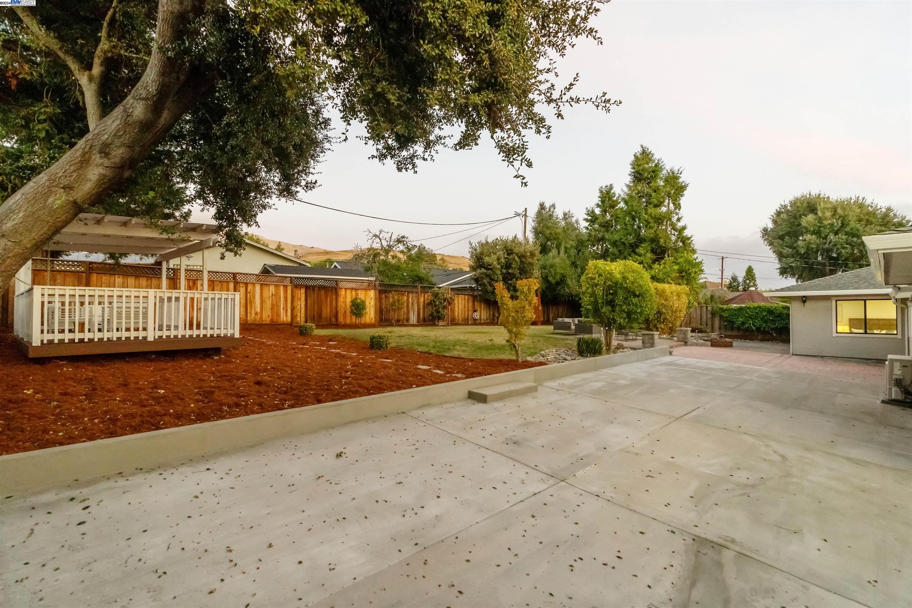 Warm Springs Fremont, CA 94539 - Photo 25 of 27 a front view of a house with a yard