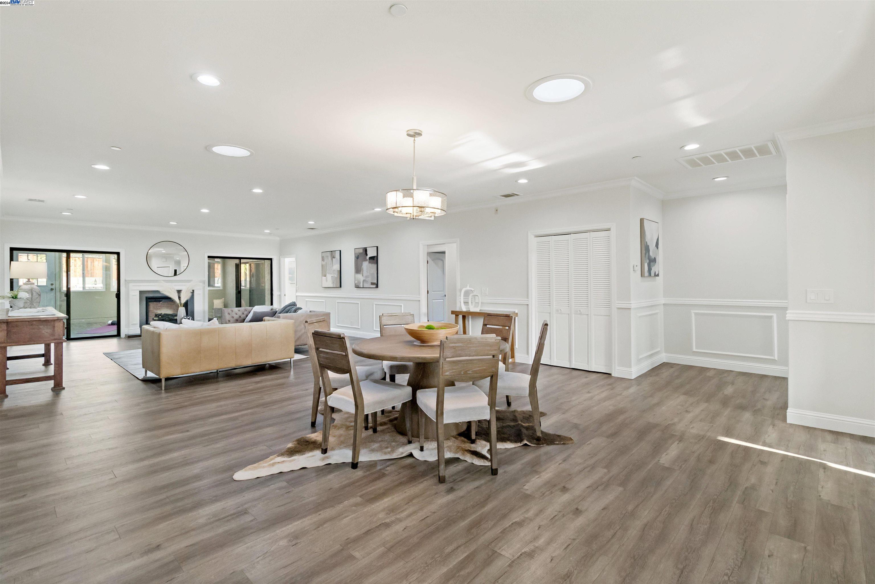 Warm Springs Fremont, CA 94539 - Photo 10 of 27 a view of a dining room with furniture and wooden floor