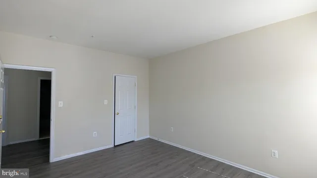a bathroom with a bathtub and a window