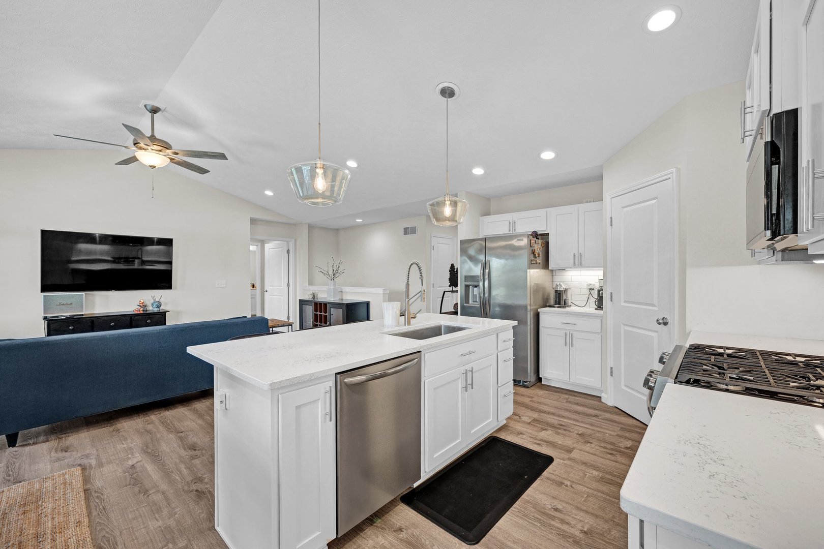 277 Cassidy Road Normal, IL 61761 - Photo 8 of 42 a kitchen that has a lot of white cabinets and stainless steel appliances