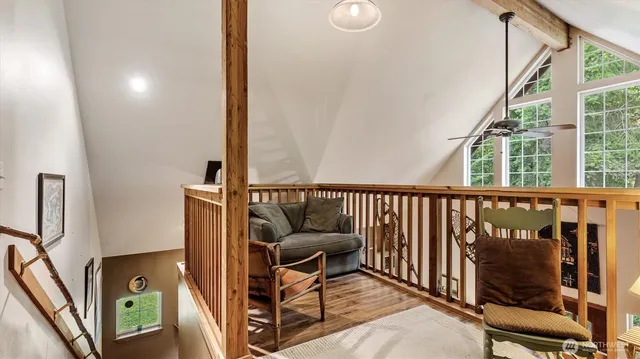 a view of a balcony with furniture