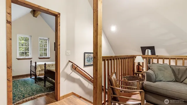a view of living room and wooden floor