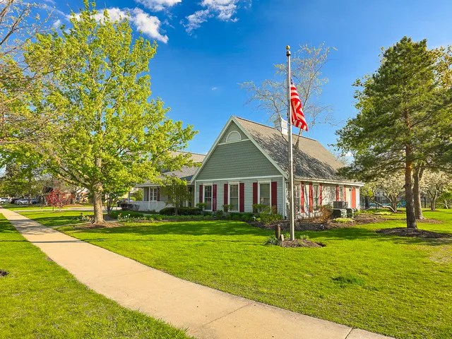 a view of a house with a big yard