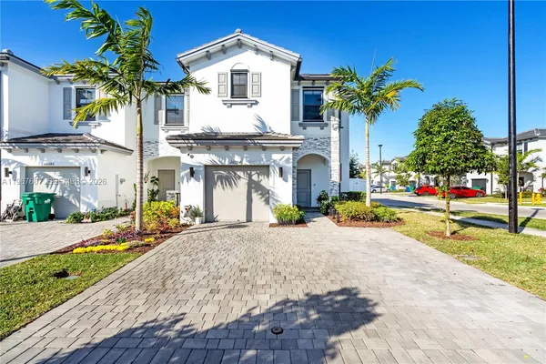 a front view of house with yard