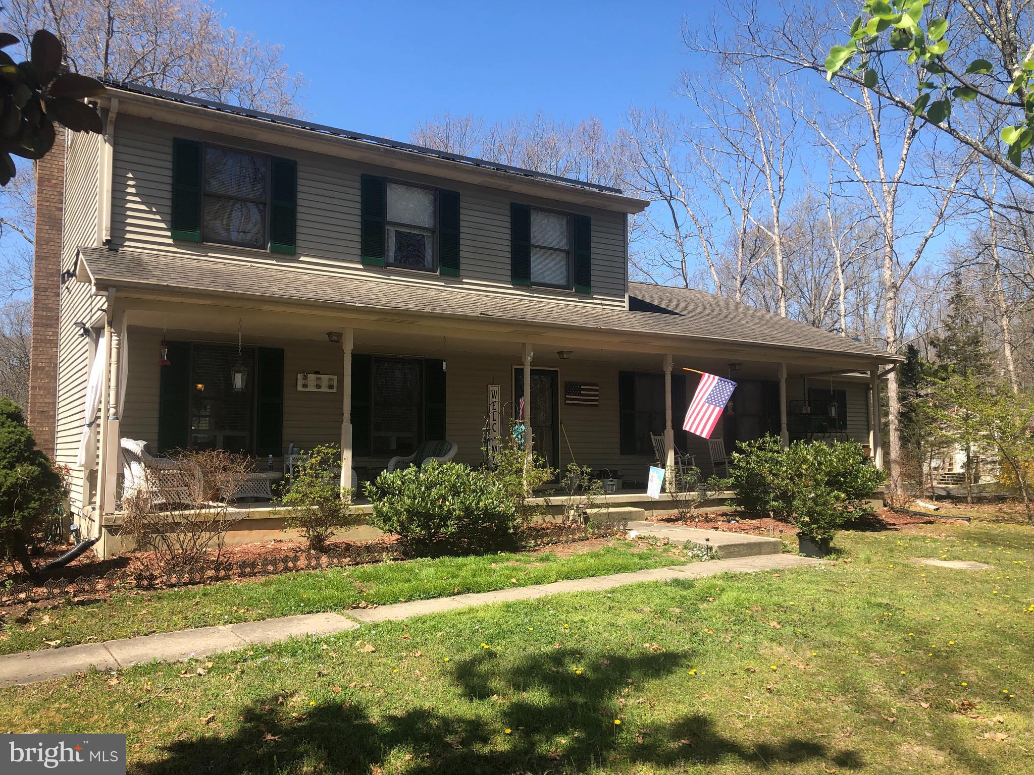 437 Highway 73 Hammonton, NJ 08037 - Photo 2 of 36 Covered porch is the full length of the home.