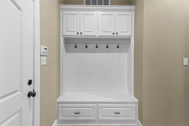 a view of bathroom with cabinet