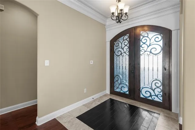 a view of an entryway with a door