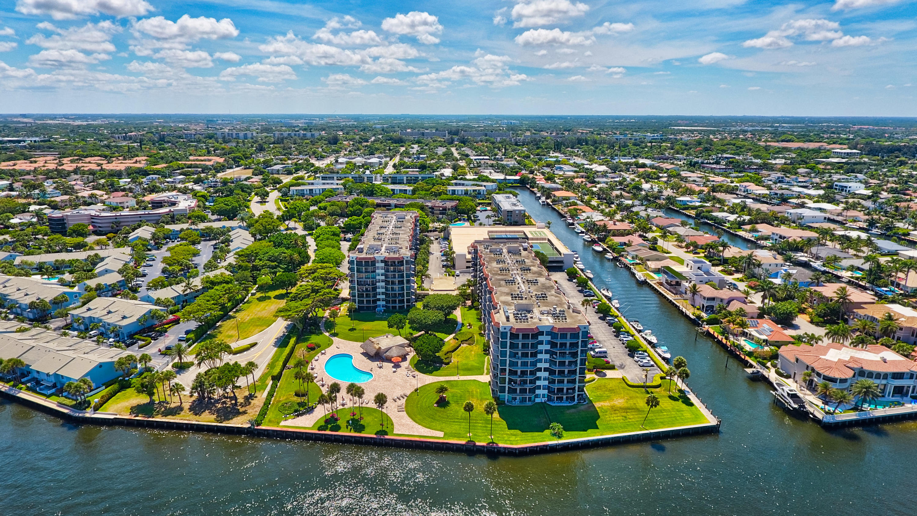 859 Jeffery Street, Unit 702 Boca Raton, FL 33487 - Photo 7 of 40 an aerial view of residential houses with outdoor space and swimming pool