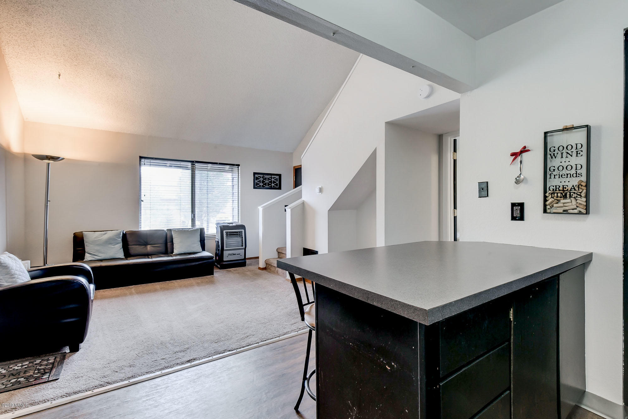 1200 South Riordan Ranch Street, Unit 16126 Flagstaff, AZ 86001 - Photo 6 of 21 Kitchen and Living Area