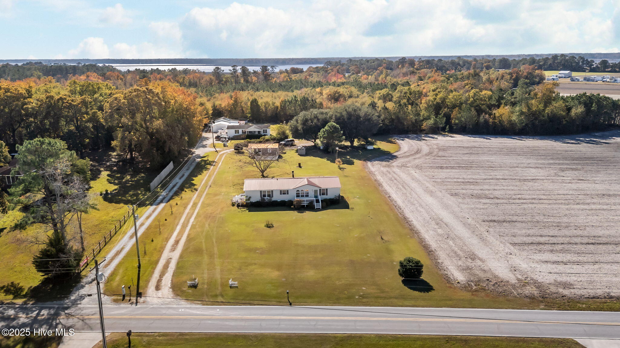 758 Wetherington Landing Road Stella, NC 28582 - Photo 38 of 49 Aerial-open farm field next door