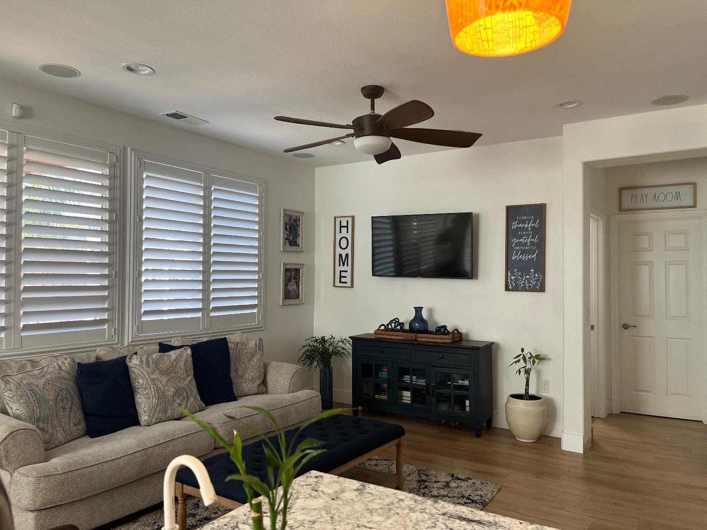 1705 Piazza Drive Salinas, CA 93905 - Photo 11 of 29 a living room with furniture and a flat screen tv