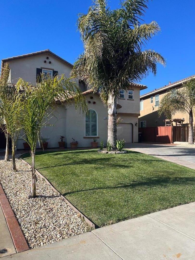 1705 Piazza Drive Salinas, CA 93905 - Photo 2 of 29 a front view of a house with garden