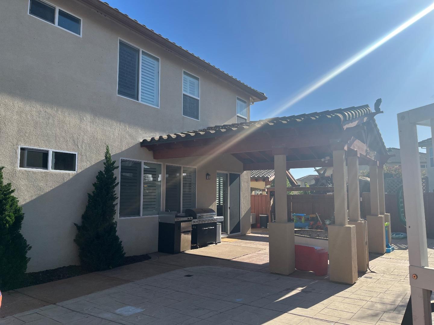 1705 Piazza Drive Salinas, CA 93905 - Photo 29 of 29 a view of a living room kitchen and a chandelier