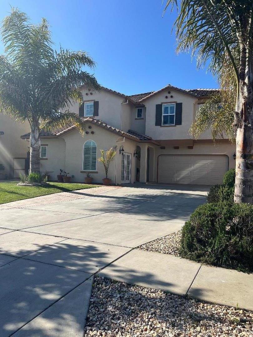 1705 Piazza Drive Salinas, CA 93905 - Photo 3 of 29 a front view of a house with a garden