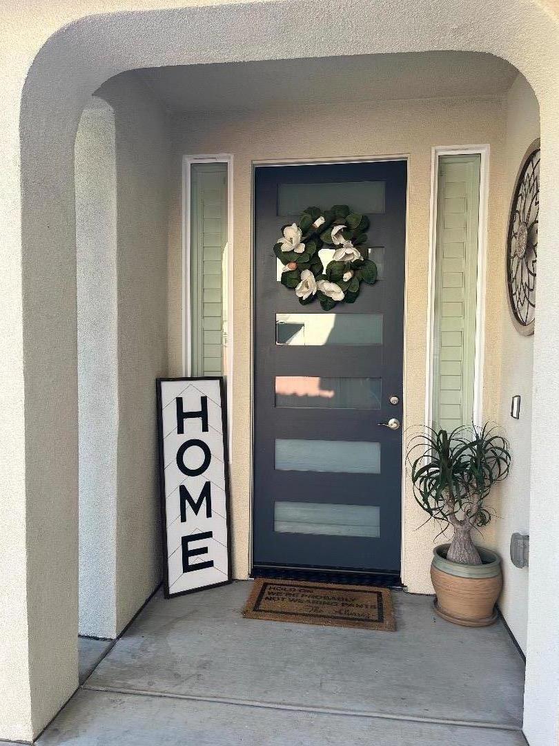 1705 Piazza Drive Salinas, CA 93905 - Photo 5 of 29 a view of front door and potted plants