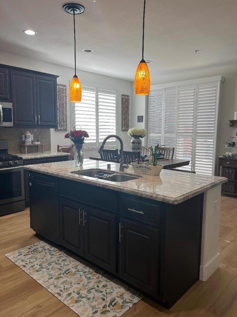 1705 Piazza Drive Salinas, CA 93905 - Photo 9 of 29 a kitchen with sink and window