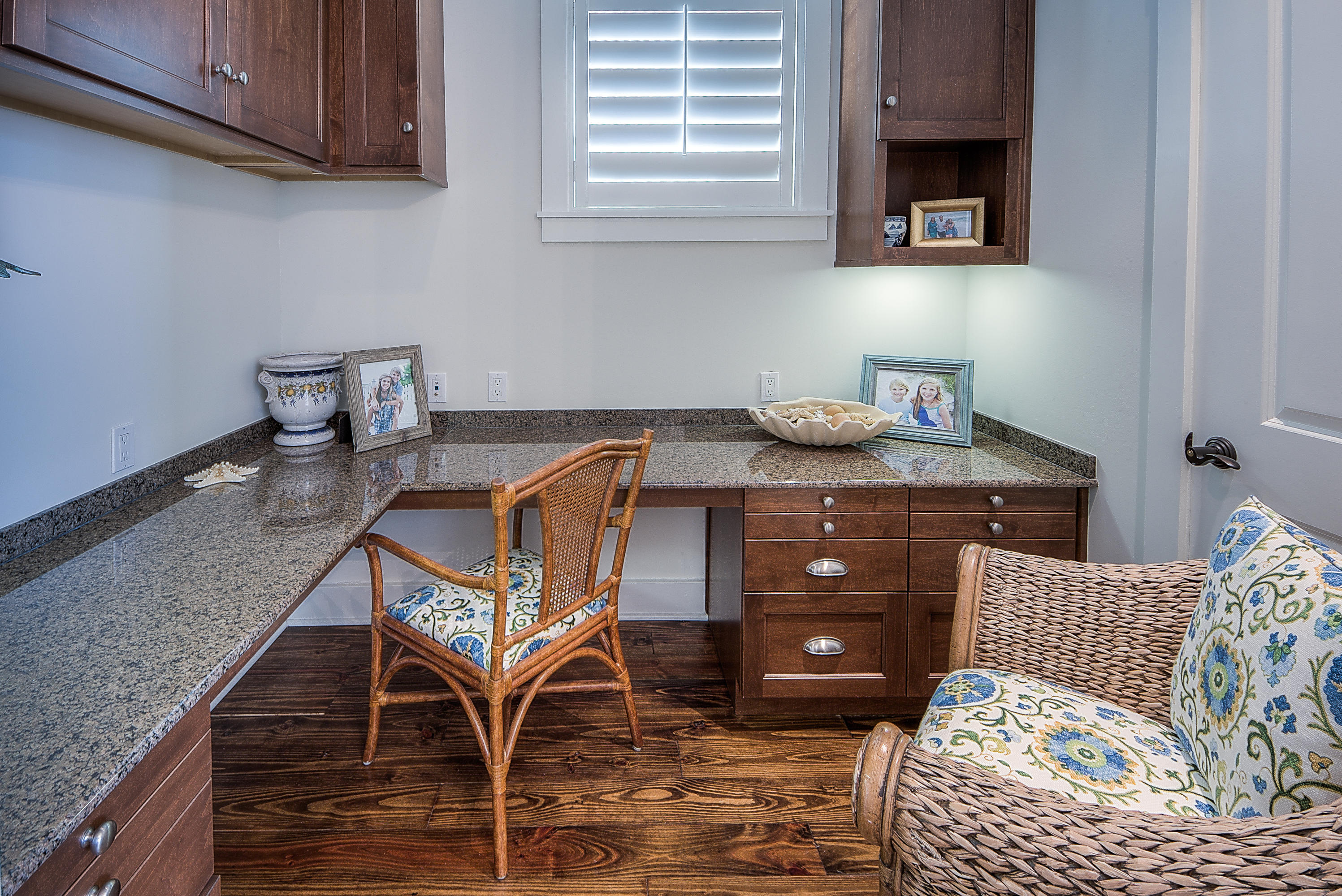37 Compass Point Way, Unit 104 Watersound, FL 32461 - Photo 15 of 27 a bedroom with a bed and a table