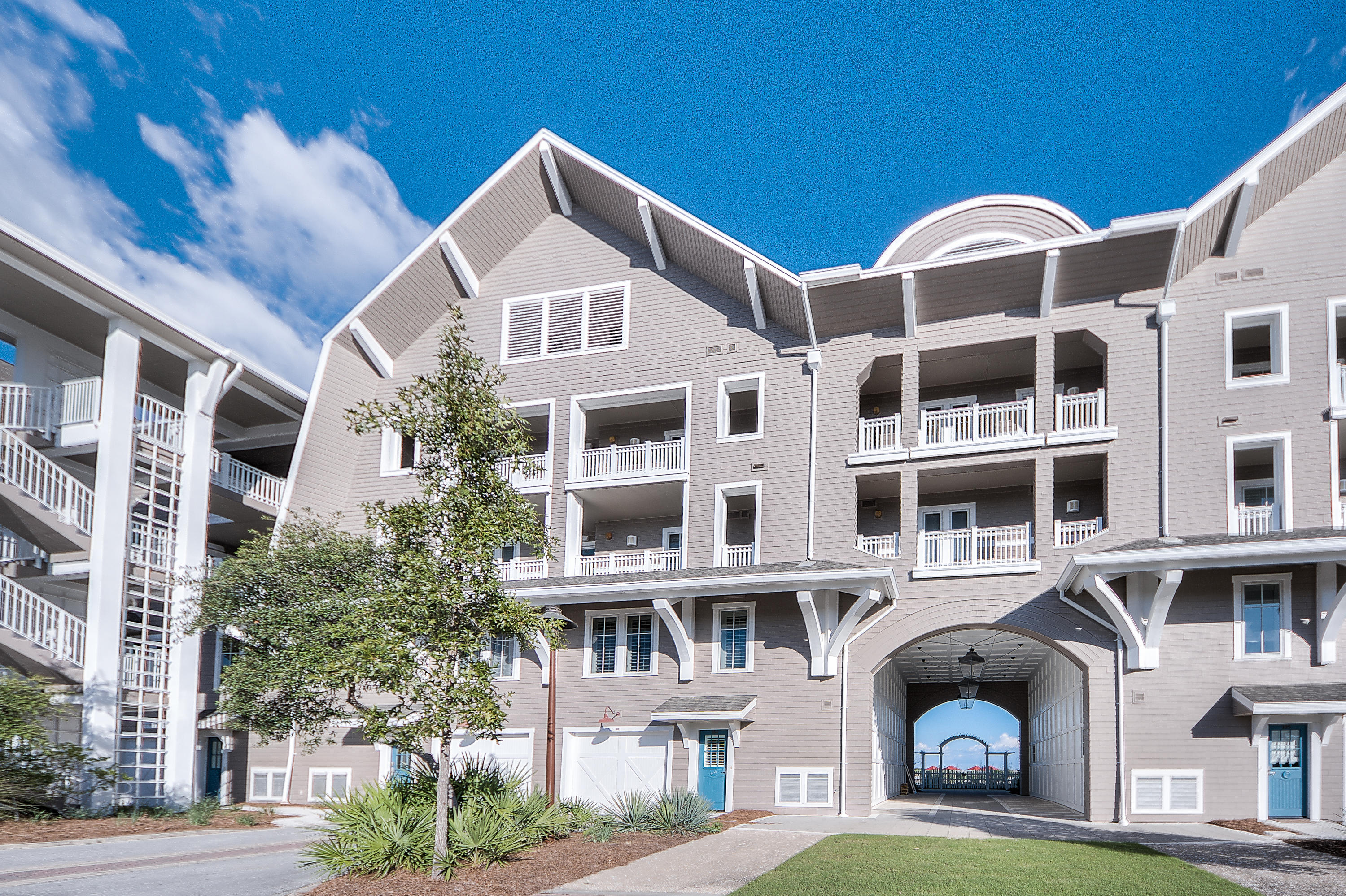 37 Compass Point Way, Unit 104 Watersound, FL 32461 - Photo 23 of 27 a front view of a multi story building