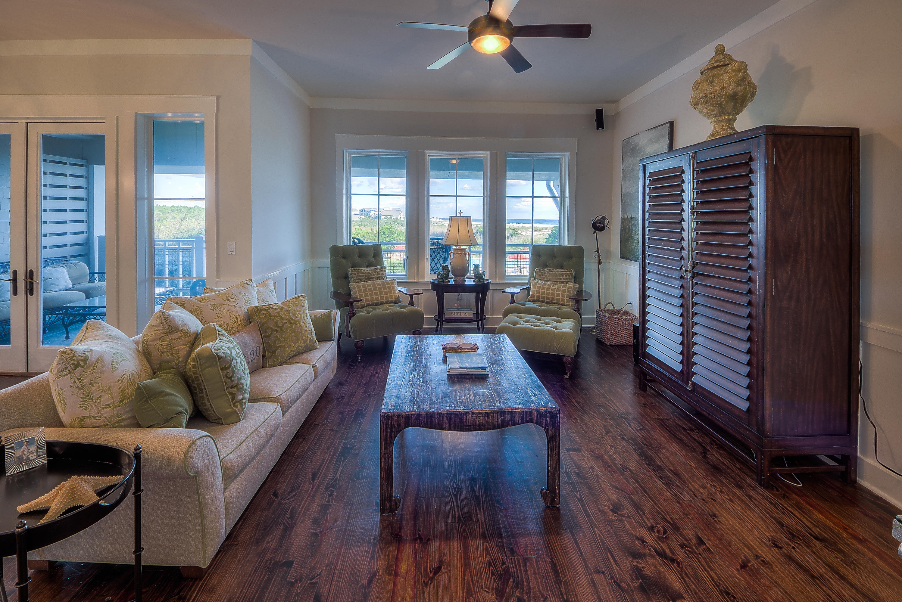 37 Compass Point Way, Unit 104 Watersound, FL 32461 - Photo 5 of 27 a living room with furniture and wooden floor