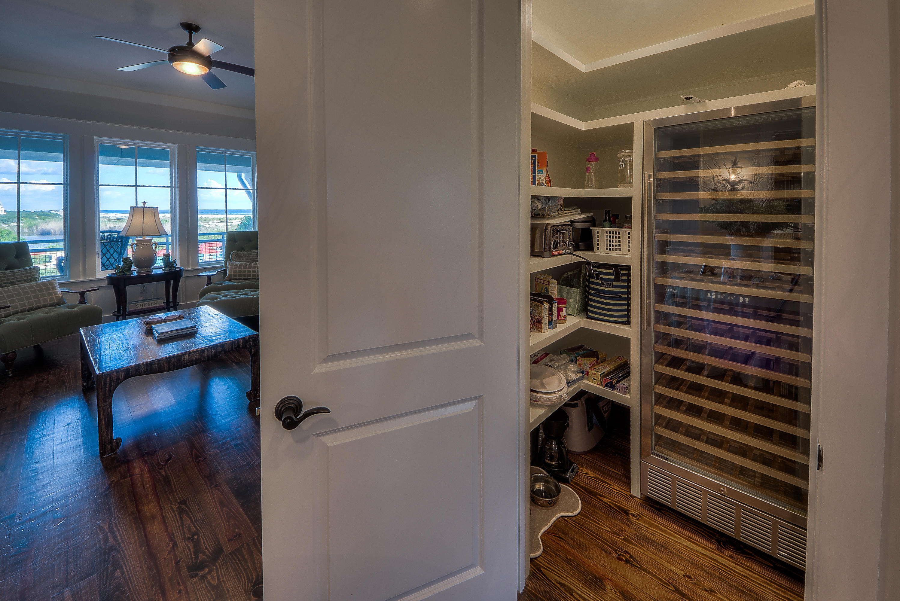 37 Compass Point Way, Unit 104 Watersound, FL 32461 - Photo 10 of 27 a view of walk in closet with clothes and shoes