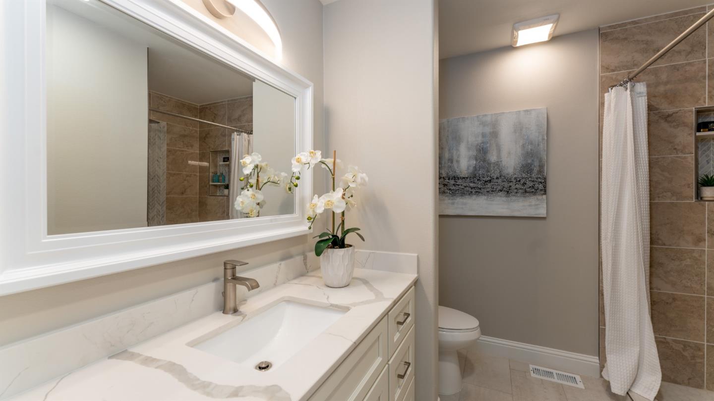3253 Cheryl Circle Pleasanton, CA 94588 - Photo 16 of 37 a bathroom with a sink toilet and shower
