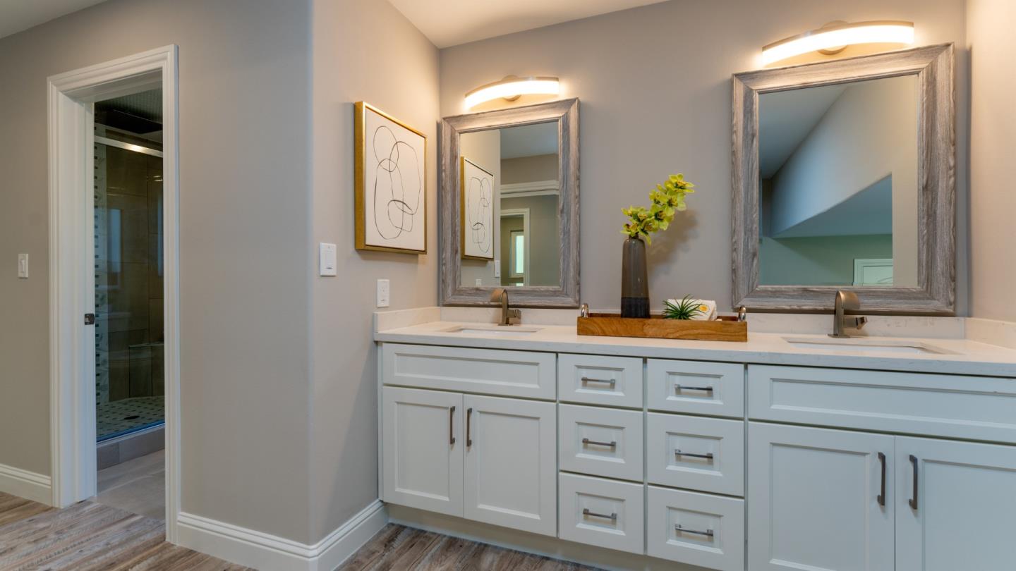 3253 Cheryl Circle Pleasanton, CA 94588 - Photo 20 of 37 a bathroom with a double vanity sink and a mirror