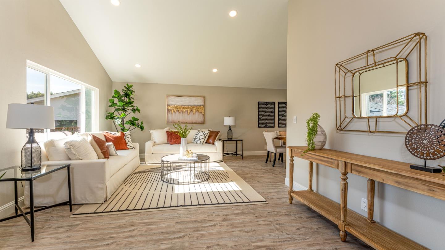 3253 Cheryl Circle Pleasanton, CA 94588 - Photo 4 of 37 a living room with furniture and a wooden floor