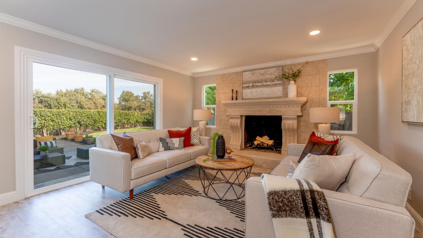 3253 Cheryl Circle Pleasanton, CA 94588 - Photo 7 of 37 a living room with furniture and a fireplace