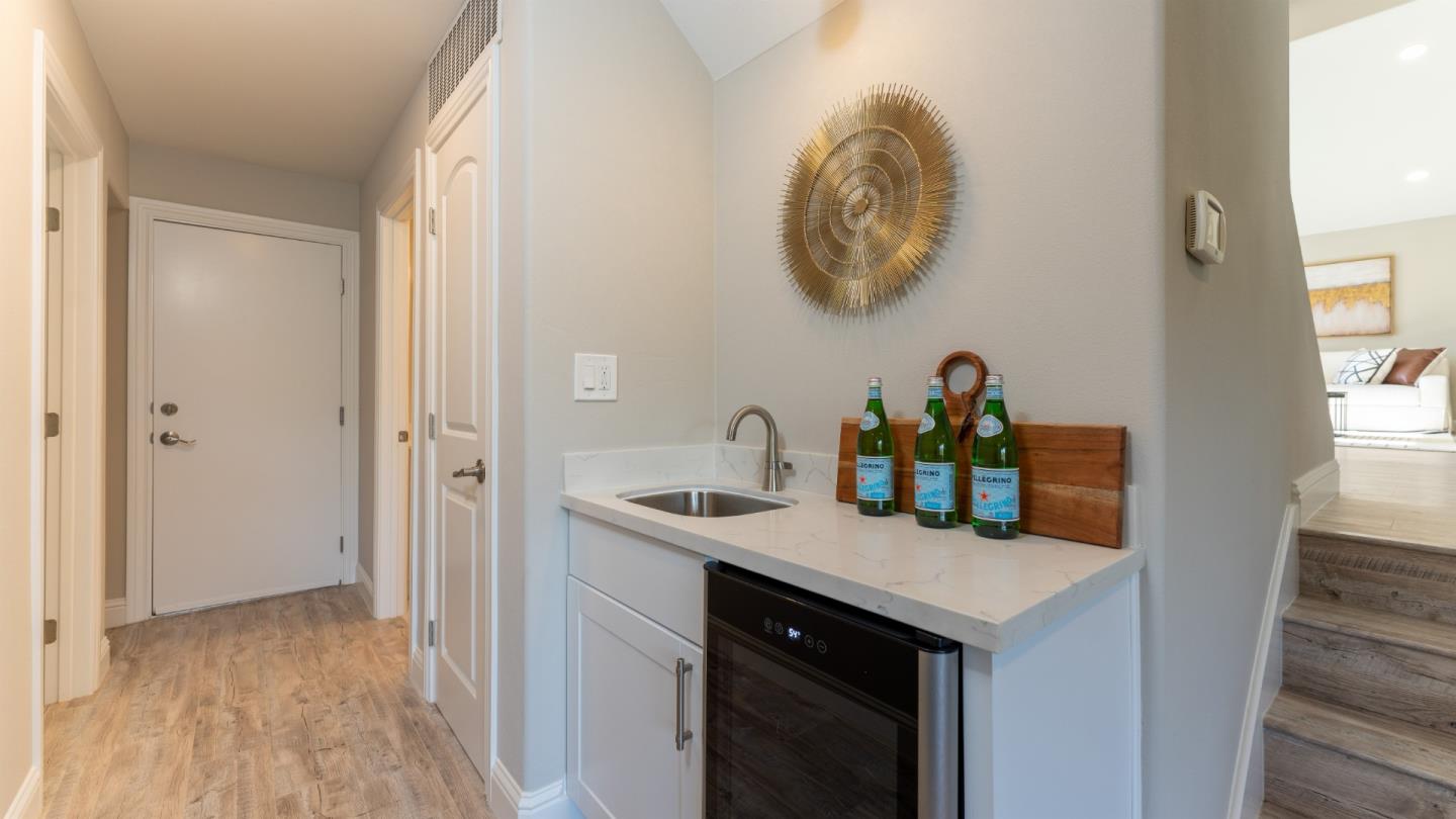 3253 Cheryl Circle Pleasanton, CA 94588 - Photo 9 of 37 a kitchen with a sink and a refrigerator