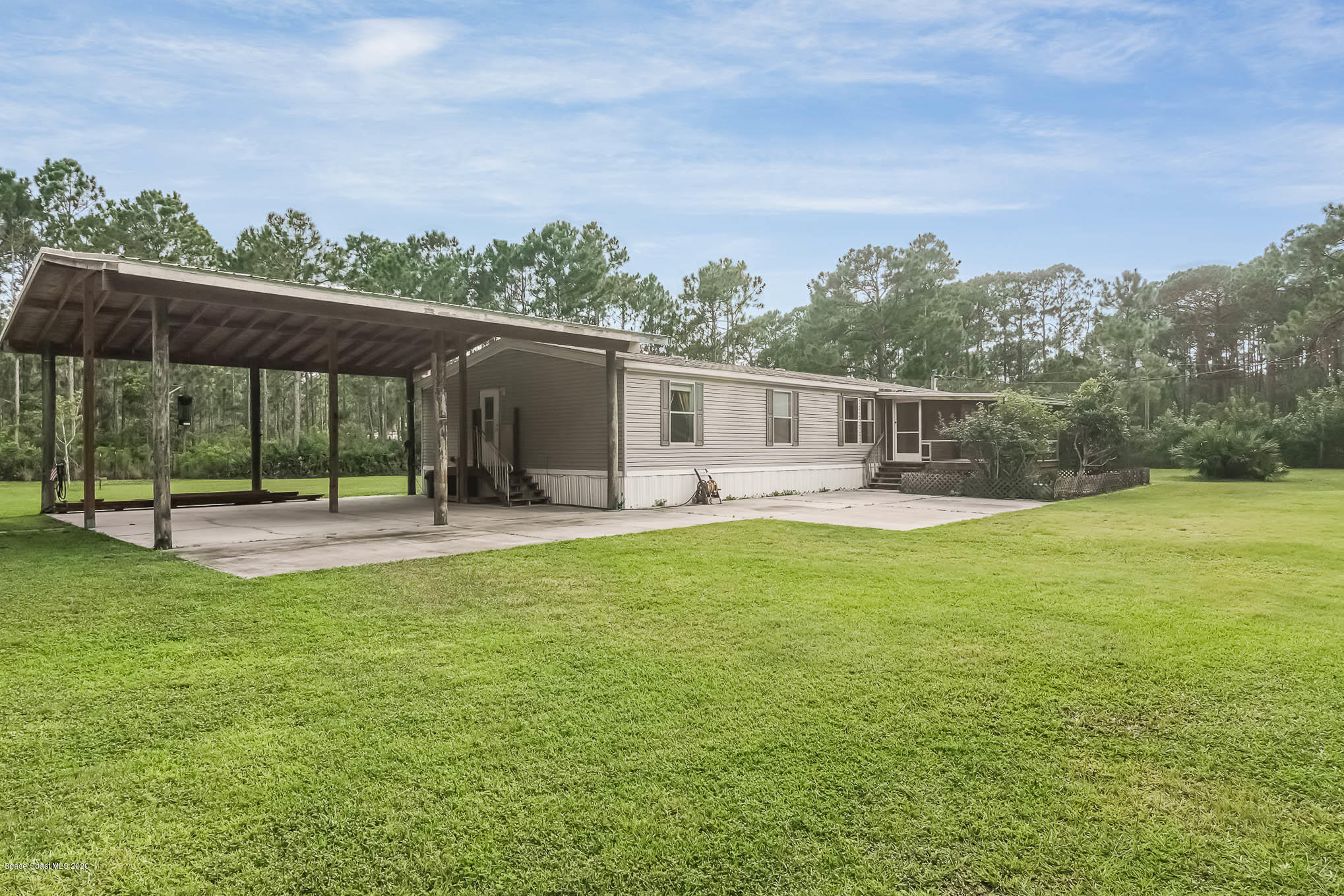 10401 Epiphyte Road Mims, FL 32754 - Photo 1 of 29 Front
