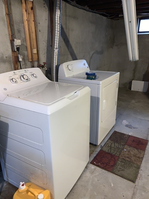 154 Mayflower Road Springfield, MA 01118 - Photo 12 of 15 a utility room with dryer and washer