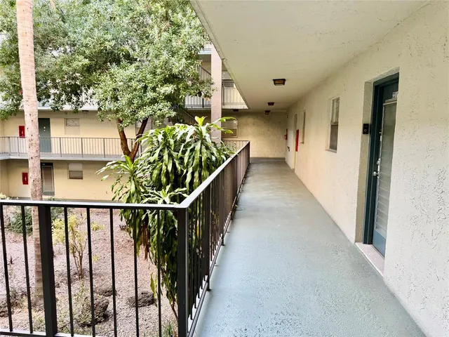 a view of a potted plants on a balcony