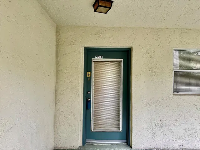 a kitchen with a stove cabinets and a refrigerator