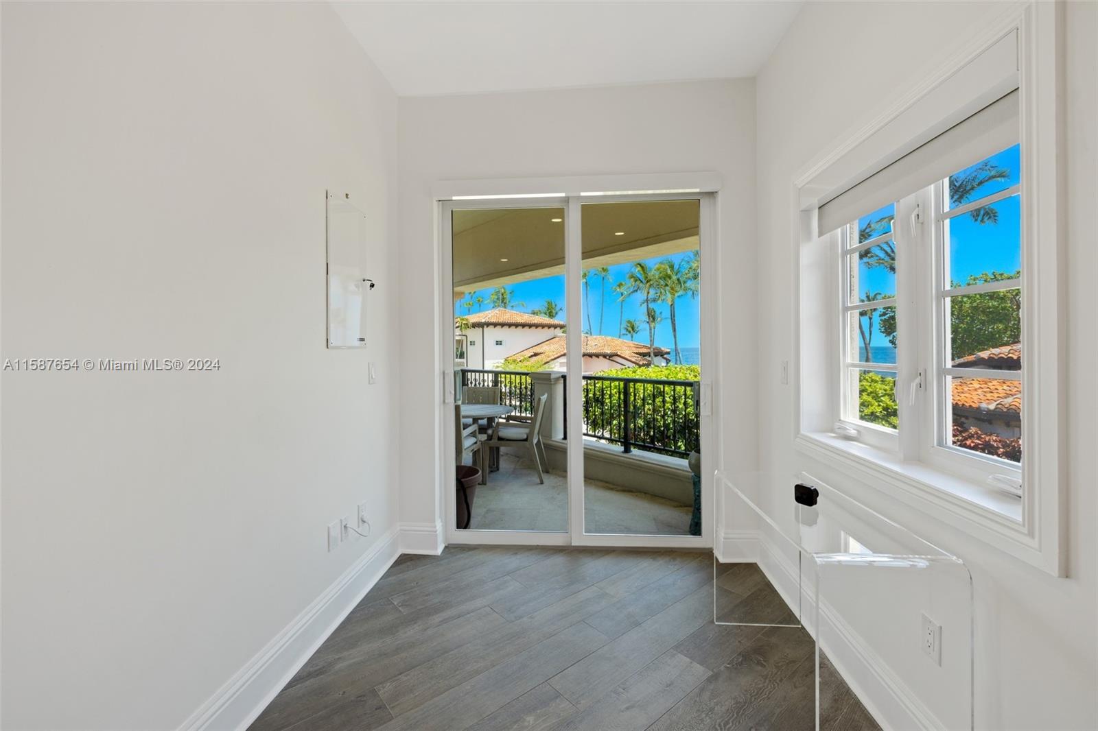 15122 Fisher Island Drive, Unit 15122 Miami Beach, FL 33109 - Photo 14 of 55 an entryway and livingroom with furniture