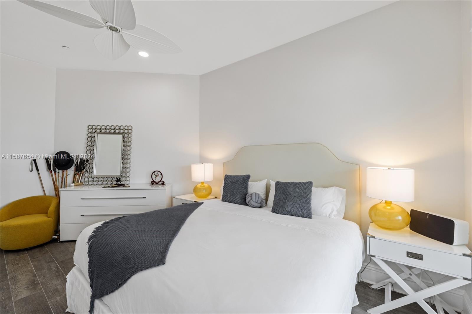 15122 Fisher Island Drive, Unit 15122 Miami Beach, FL 33109 - Photo 19 of 55 a bedroom with a bed and window