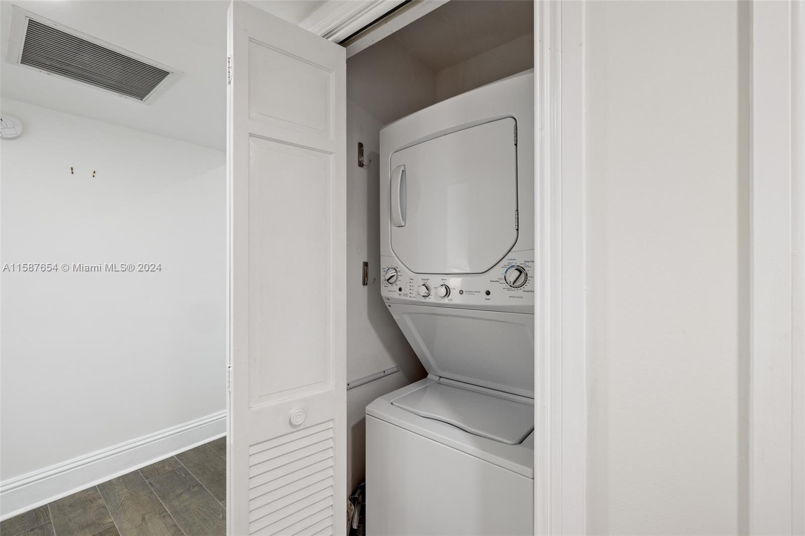 15122 Fisher Island Drive, Unit 15122 Miami Beach, FL 33109 - Photo 23 of 55 a view of washer and dryer
