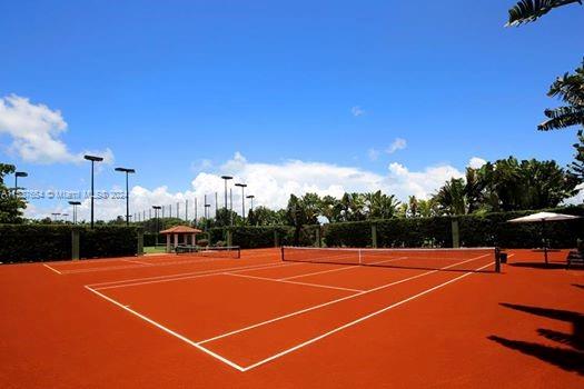 15122 Fisher Island Drive, Unit 15122 Miami Beach, FL 33109 - Photo 40 of 55 a view of a tennis court with view of a tennis court