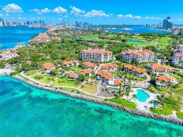 a view of a city with an ocean