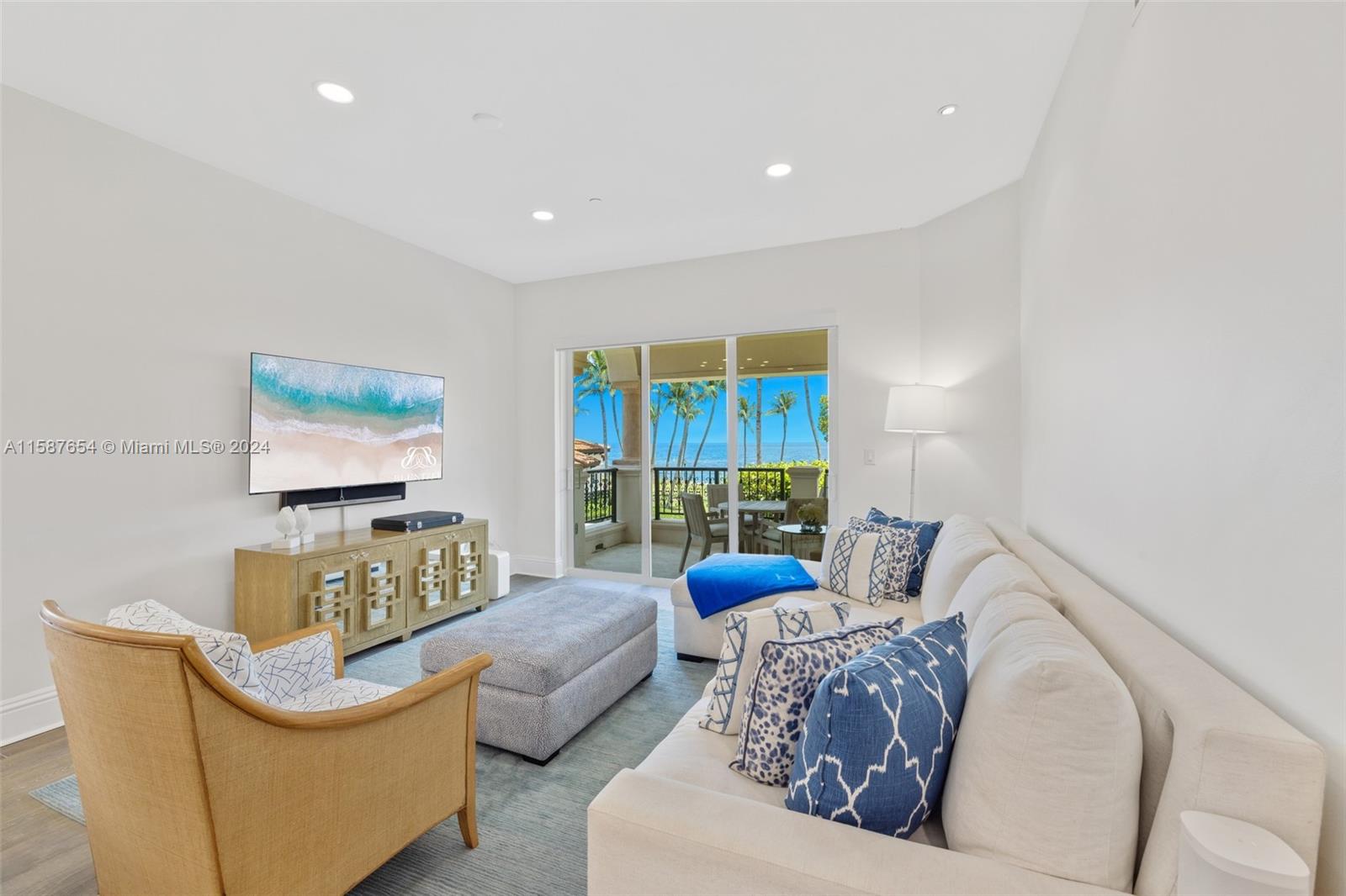 15122 Fisher Island Drive, Unit 15122 Miami Beach, FL 33109 - Photo 5 of 55 a living room with furniture and a large window