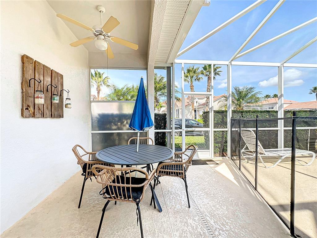 802 Brunello Drive Davenport, FL 33897 - Photo 28 of 36 a view of a dining room with furniture window and outside view