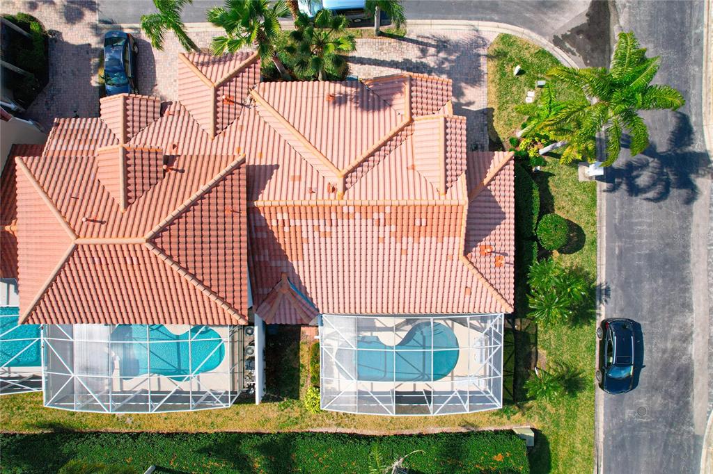 802 Brunello Drive Davenport, FL 33897 - Photo 33 of 36 a front view of a house with a garden and deck
