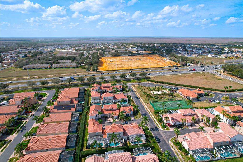 802 Brunello Drive Davenport, FL 33897 - Photo 34 of 36 an aerial view of residential building and ocean