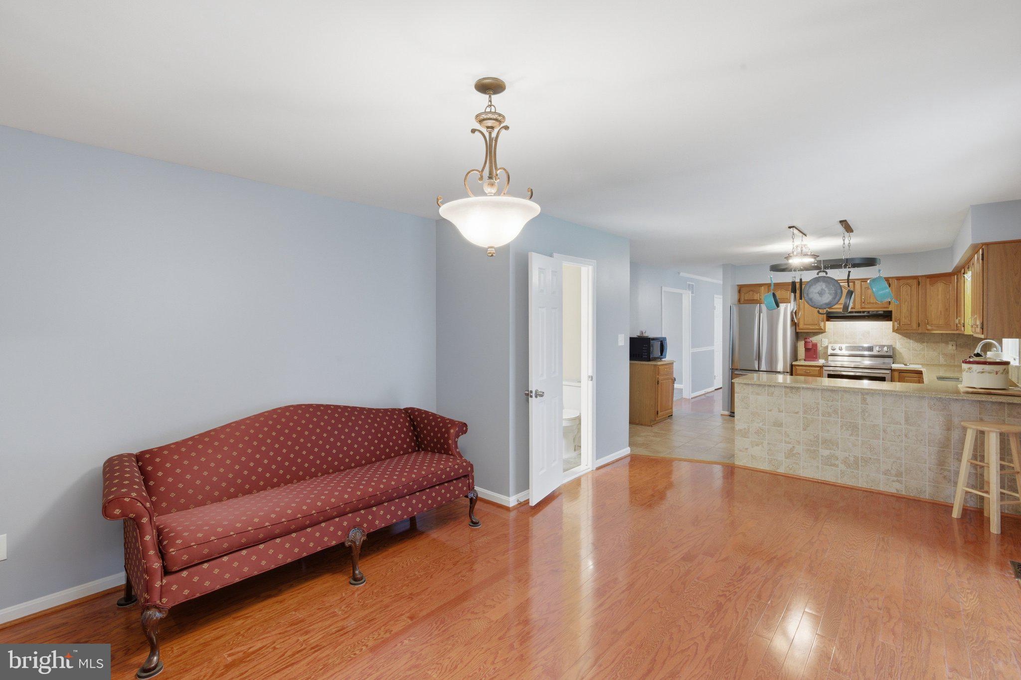 18310 Upper Beckleysville Road Hampstead, MD 21074 - Photo 23 of 67 Spacious living area with warm tones.