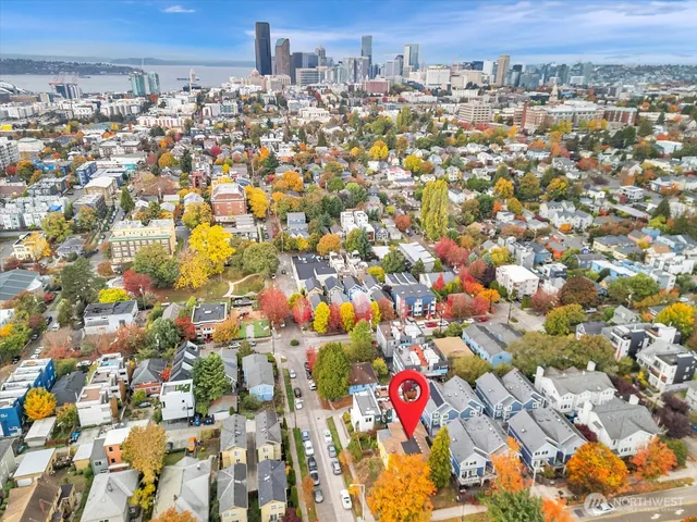 an aerial view of city and parking space