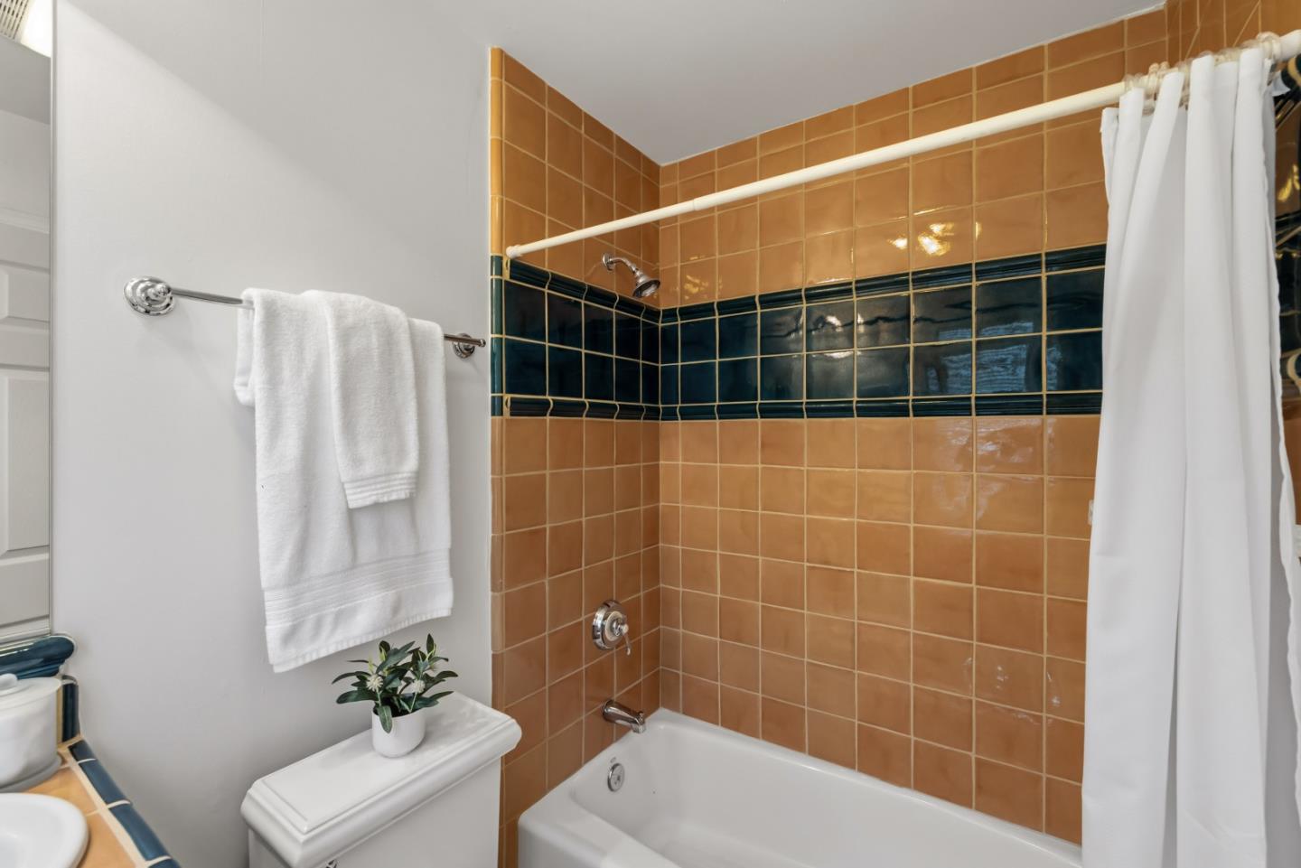 302 Pasadera Drive Monterey, CA 93940 - Photo 20 of 40 a bathroom with a toilet and shower