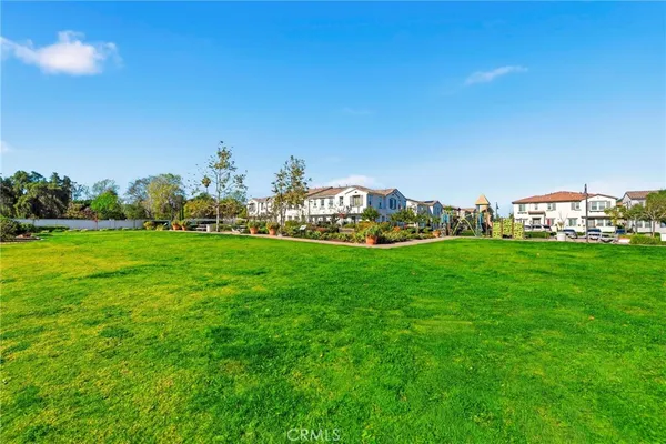 a view of a house with swimming pool and porch